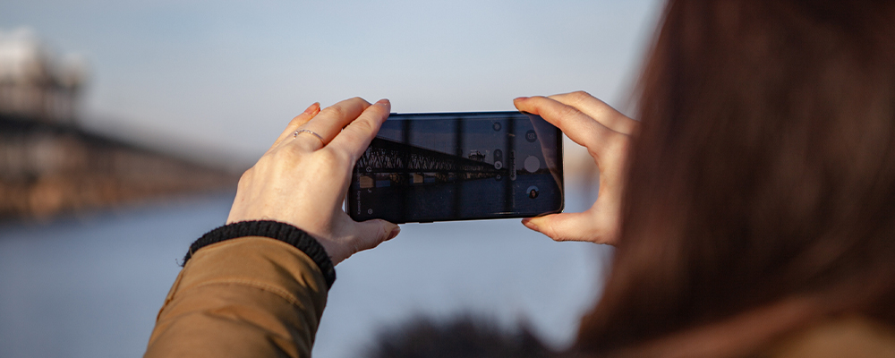 Mobile Phone taking picture of a bridge