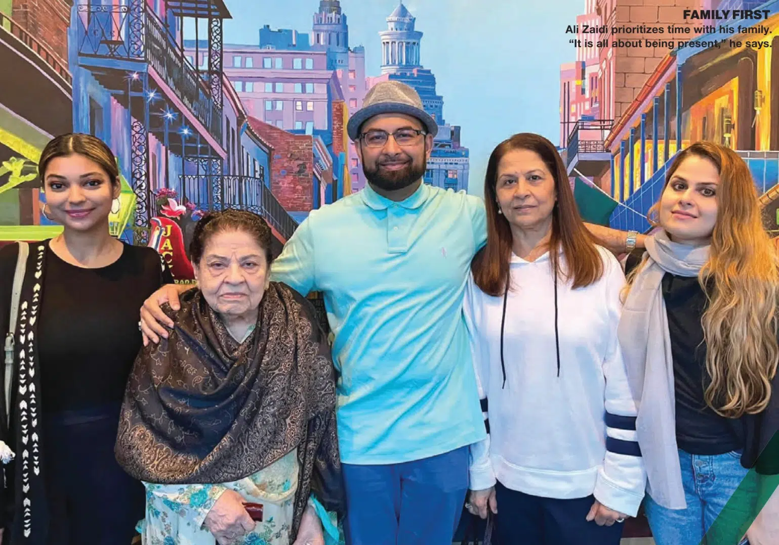 Regional Director of Sales Ali Zaidi standing next to his family.