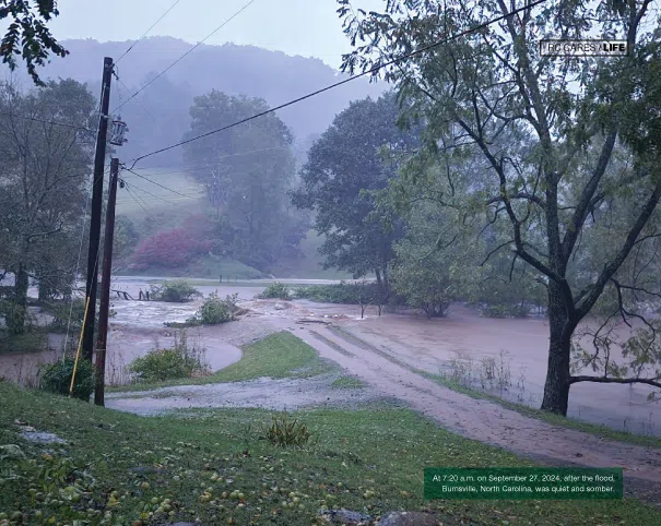At 7:20am on September 27th, 2024, after the flood in Burnsville, North Carolina. Road was flooded and power lines down